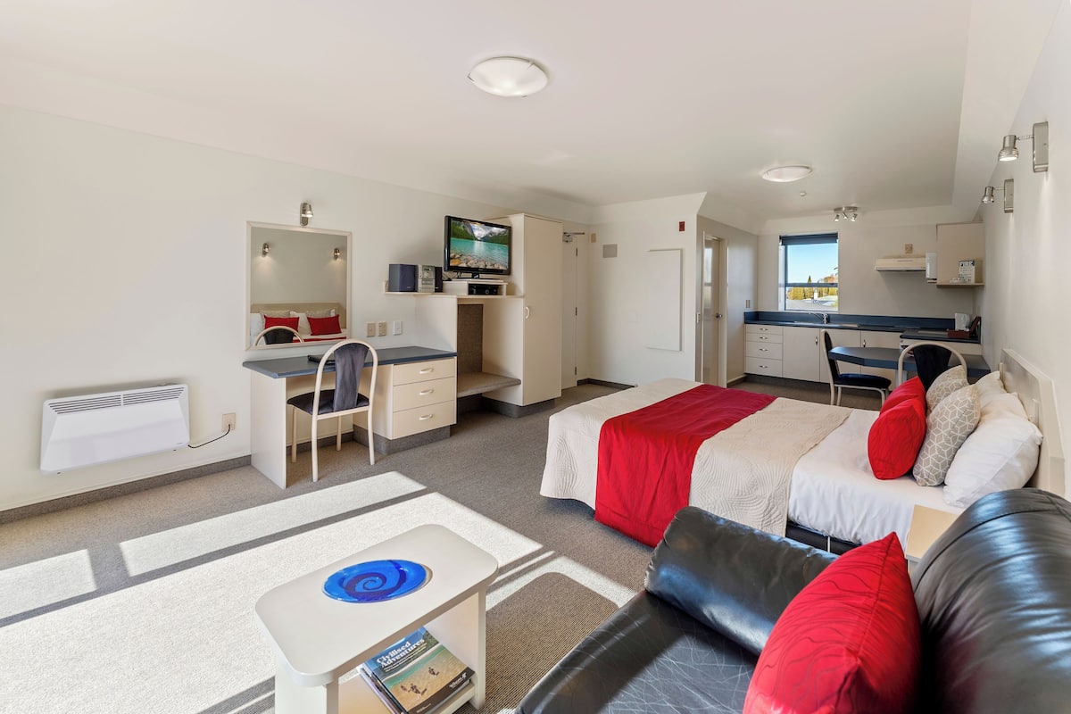 Desk, iron/ironing board, cribs (free), WiFi (free)
