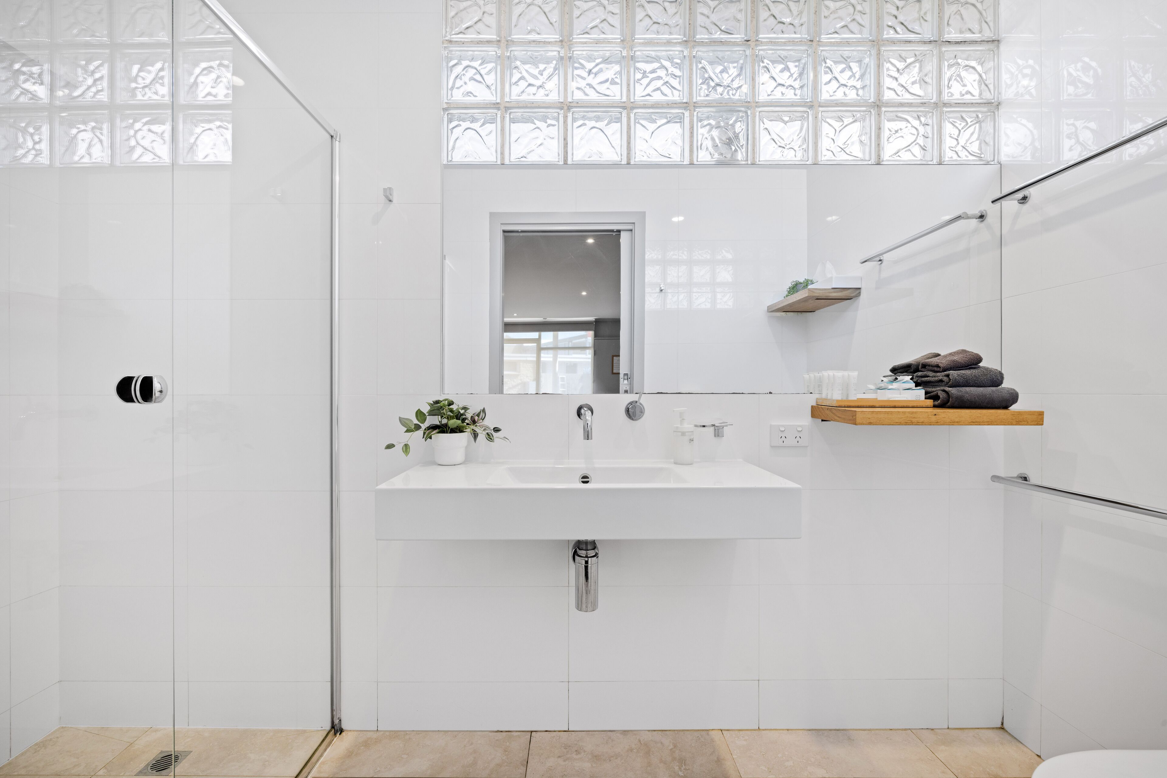 double room - 1 queen & 1 single | bathroom | hair dryer, towels