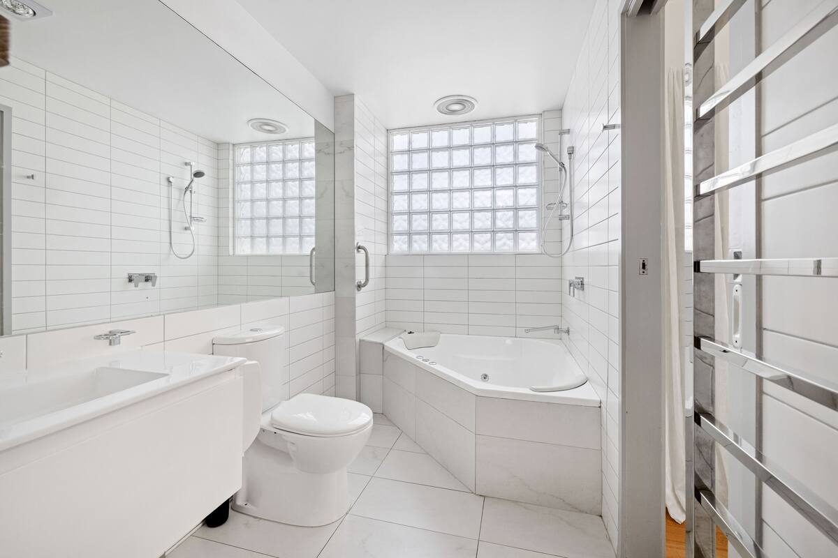 spa room - 1 queen, 1 double & 1 single | bathroom | hair dryer, towels