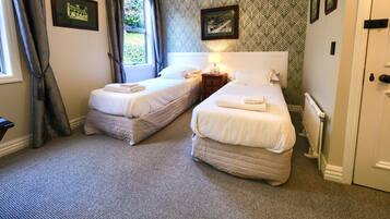Kamar Double atau Twin Deluks, 1 kamar tidur, ensuite, pemandangan kebun | 1 kamar tidur, seprai premium, dan selimut bulu angsa