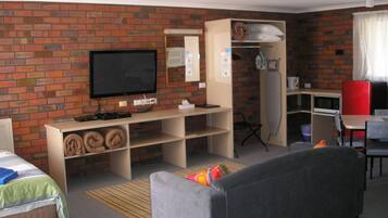 Flat-screen TV, DVD player, pay films