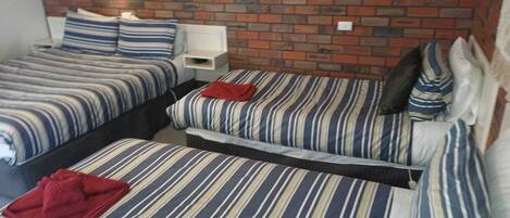 Family Room | Desk, blackout drapes, iron/ironing board, free WiFi