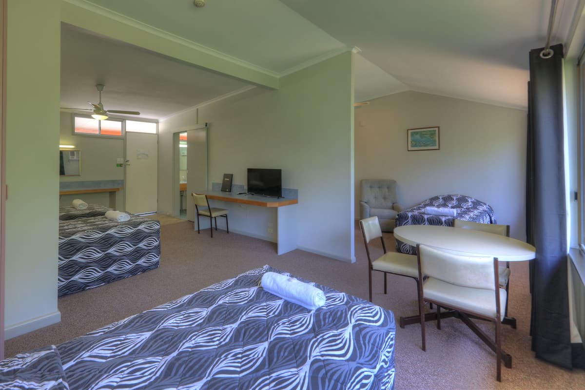 Family Room, 2 Bedrooms | Desk, blackout curtains, iron/ironing board, free WiFi