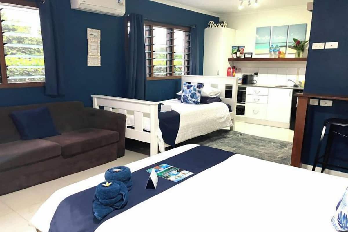 Studio Resort View Apartment | Living area | 40-inch flat-screen TV with digital channels, TV