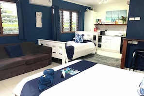 Studio Resort View Apartment | Living area | 40-inch flat-screen TV with digital channels, TV