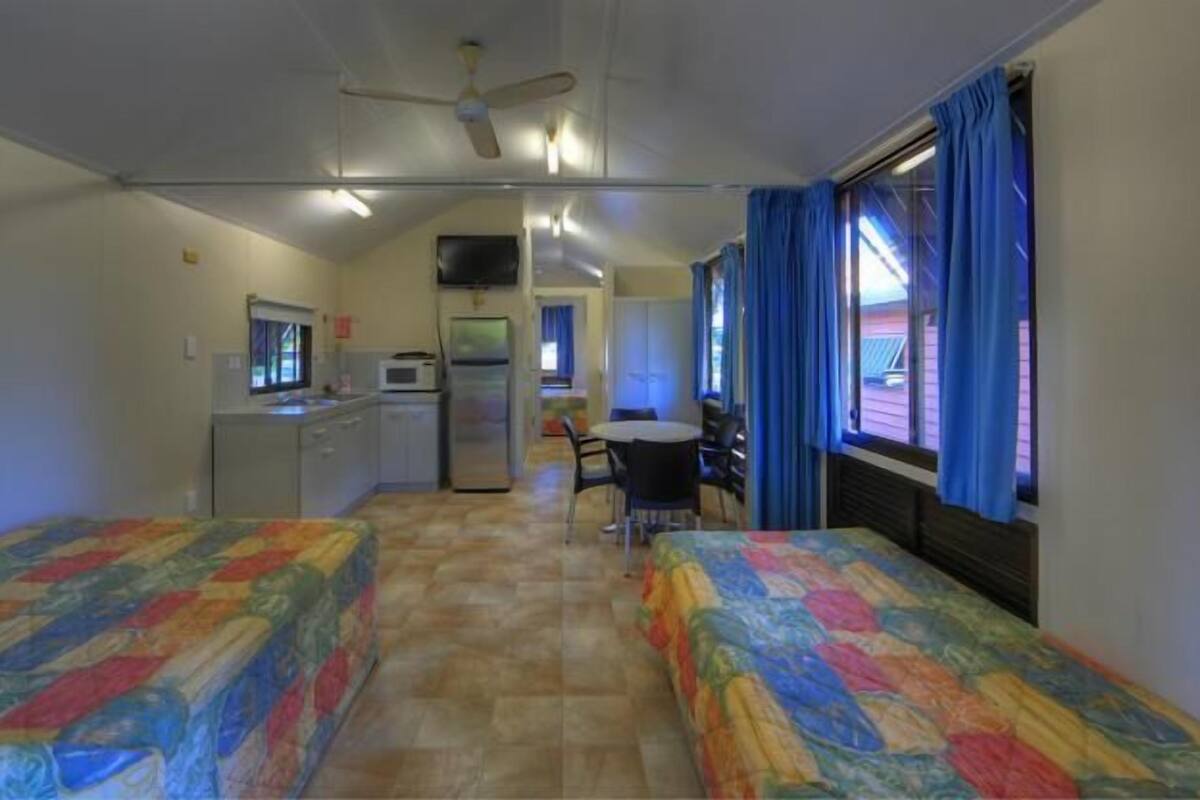 Standard Suite, 1 Bedroom, Non Smoking, Kitchen (Standard Villa) | Iron/ironing board, WiFi (free), bed sheets