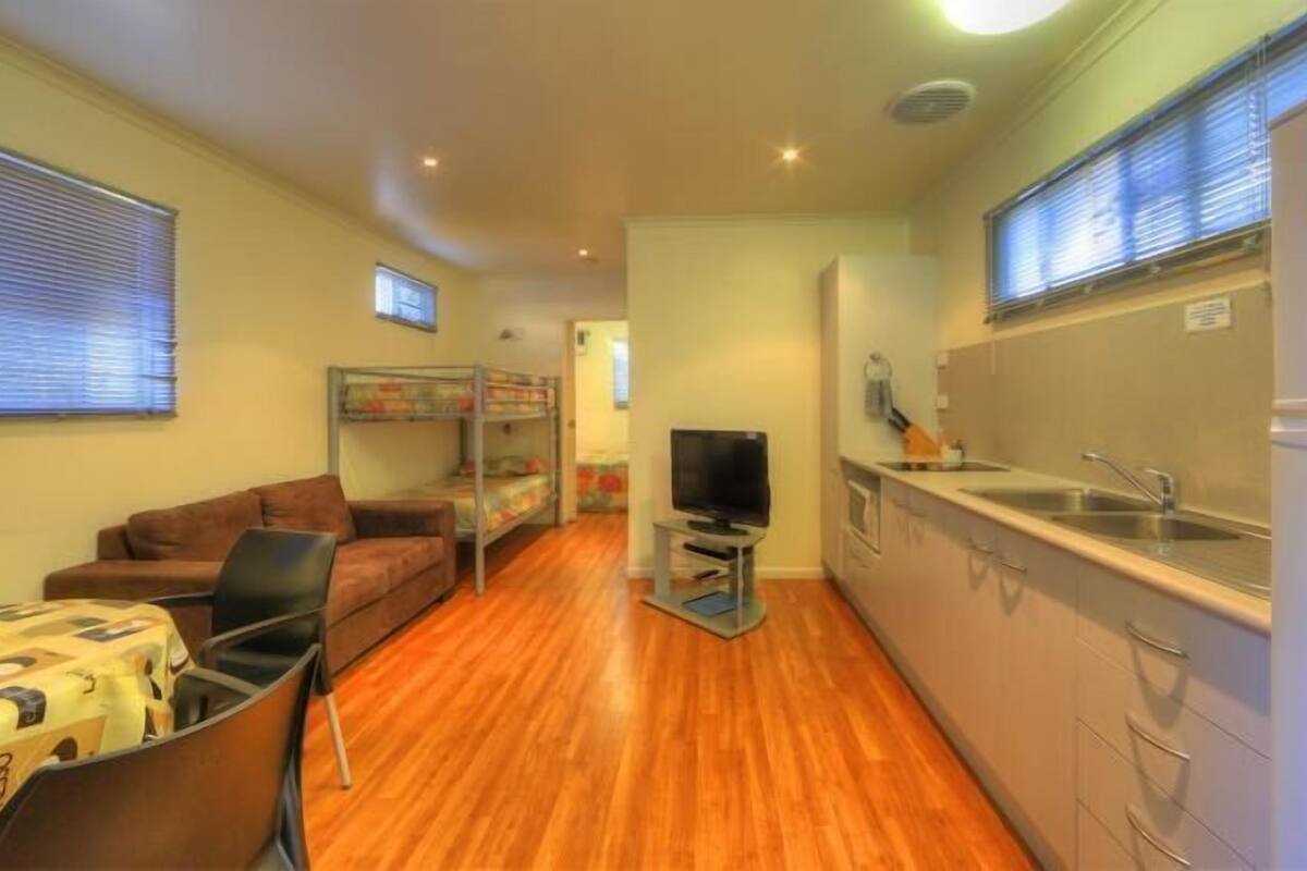 Executive Suite, 1 Bedroom, Non Smoking, Kitchen (Executive Villa) | Living area | TV, DVD player