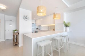 Standard Apartment | Private kitchen | Full-size fridge, microwave, oven, stovetop