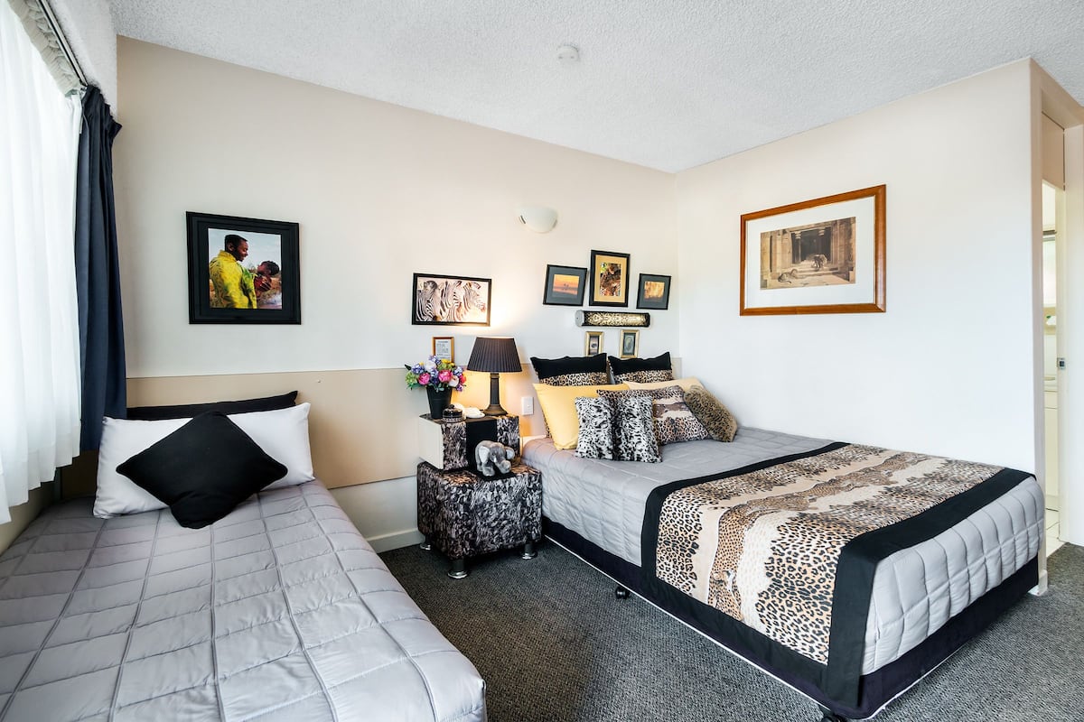 Family Room, Non Smoking | Blackout drapes, cribs (surcharge), WiFi (free), bed sheets