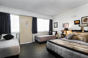 Family Room, Non Smoking | Blackout curtains, cots/infant beds, free WiFi, bed sheets