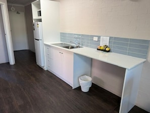 Family One Bedroom Suite | Private kitchenette | Fridge, microwave, coffee/tea maker, electric kettle