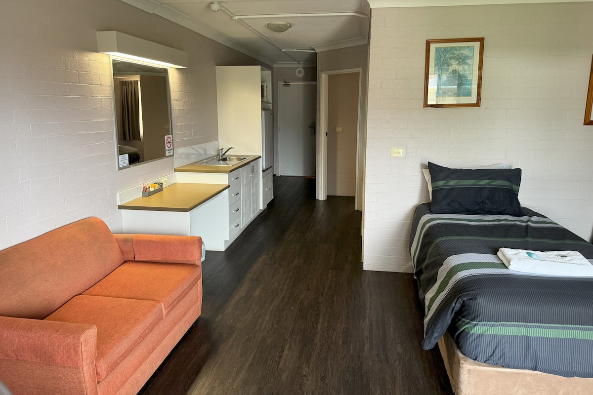 Premium bedding, pillow-top beds, desk, free WiFi