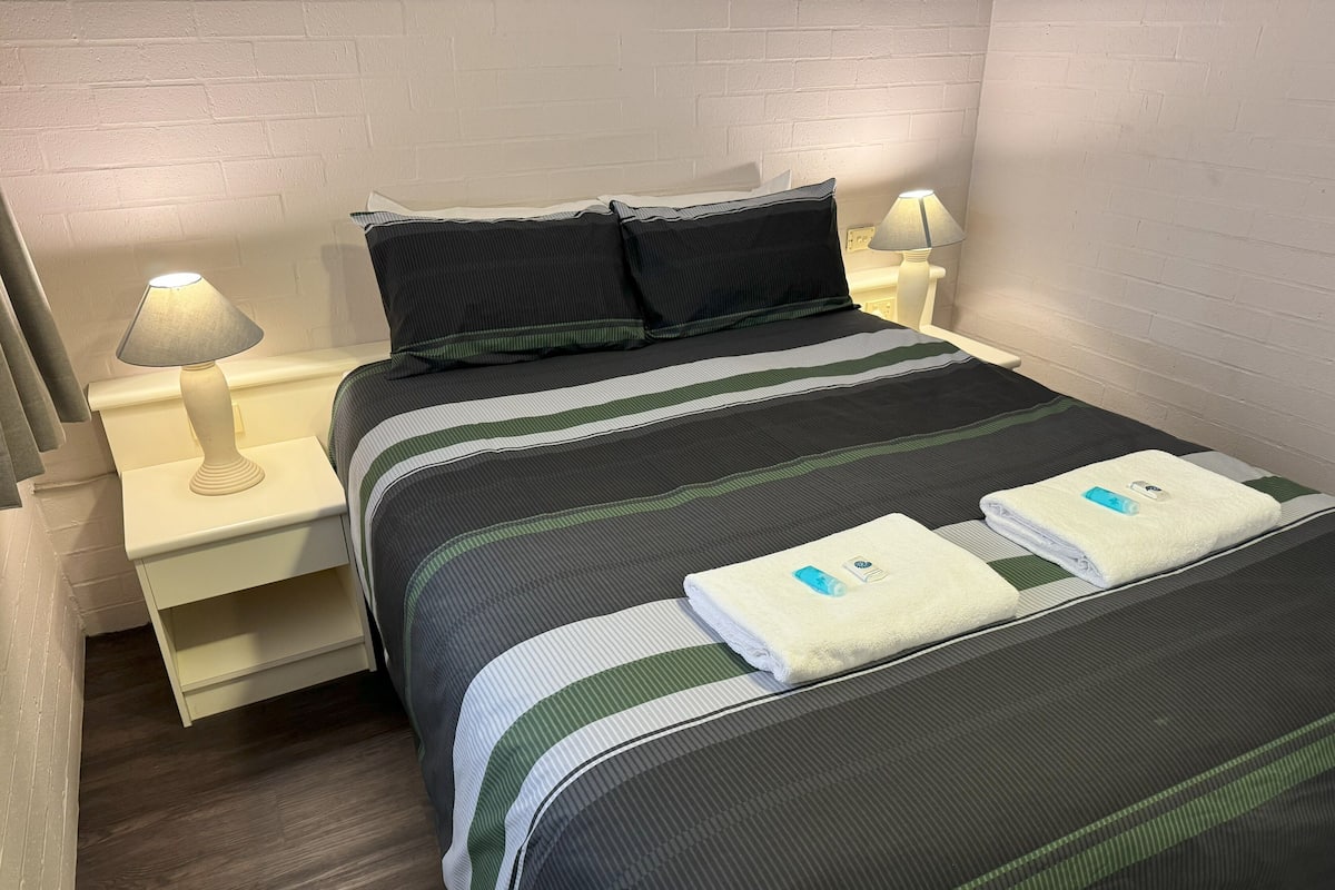 Premium bedding, pillow-top beds, desk, free WiFi