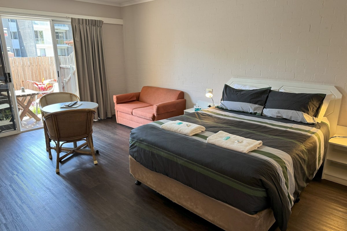 Premium bedding, pillow-top beds, desk, free WiFi