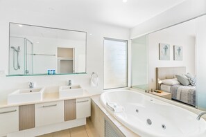 Separate tub and shower, jetted tub, hair dryer, towels
