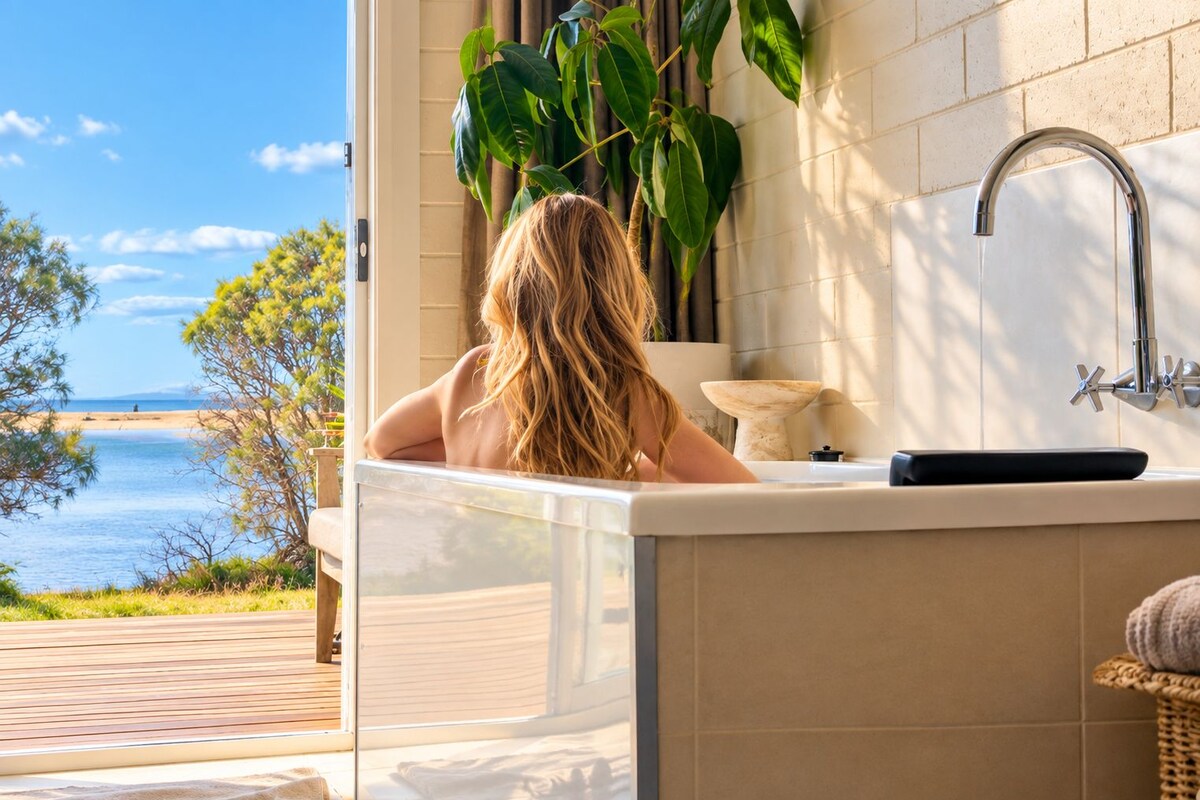 Waterfront Spa Studio | Living area | 35-inch TV with digital channels