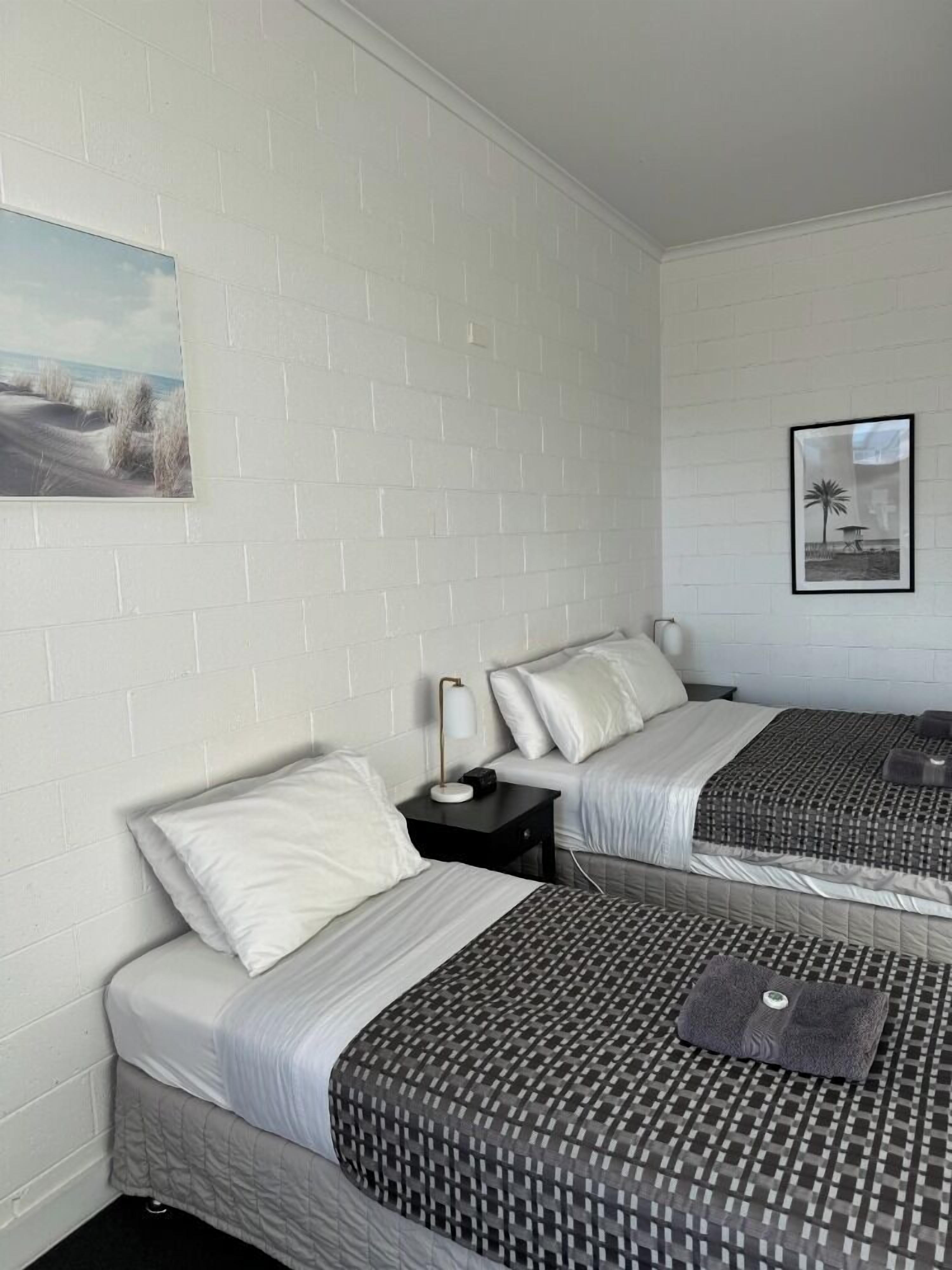 queen 2 singles room | blackout curtains, iron/ironing board, free cots/infant beds, free wifi