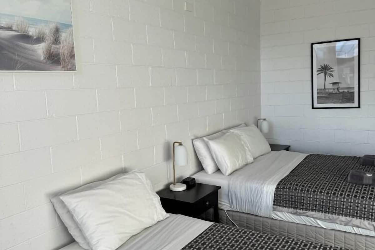 queen 2 singles room | blackout curtains, iron/ironing board, free cots/infant beds, free wifi