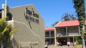 A building with a sign reading "Argyle Terrace Hotel".