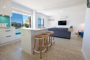 Luxury Suite, 2 Bedrooms, Ocean View, Ground Floor | Private kitchen | Full-size fridge, microwave, stovetop, coffee/tea maker