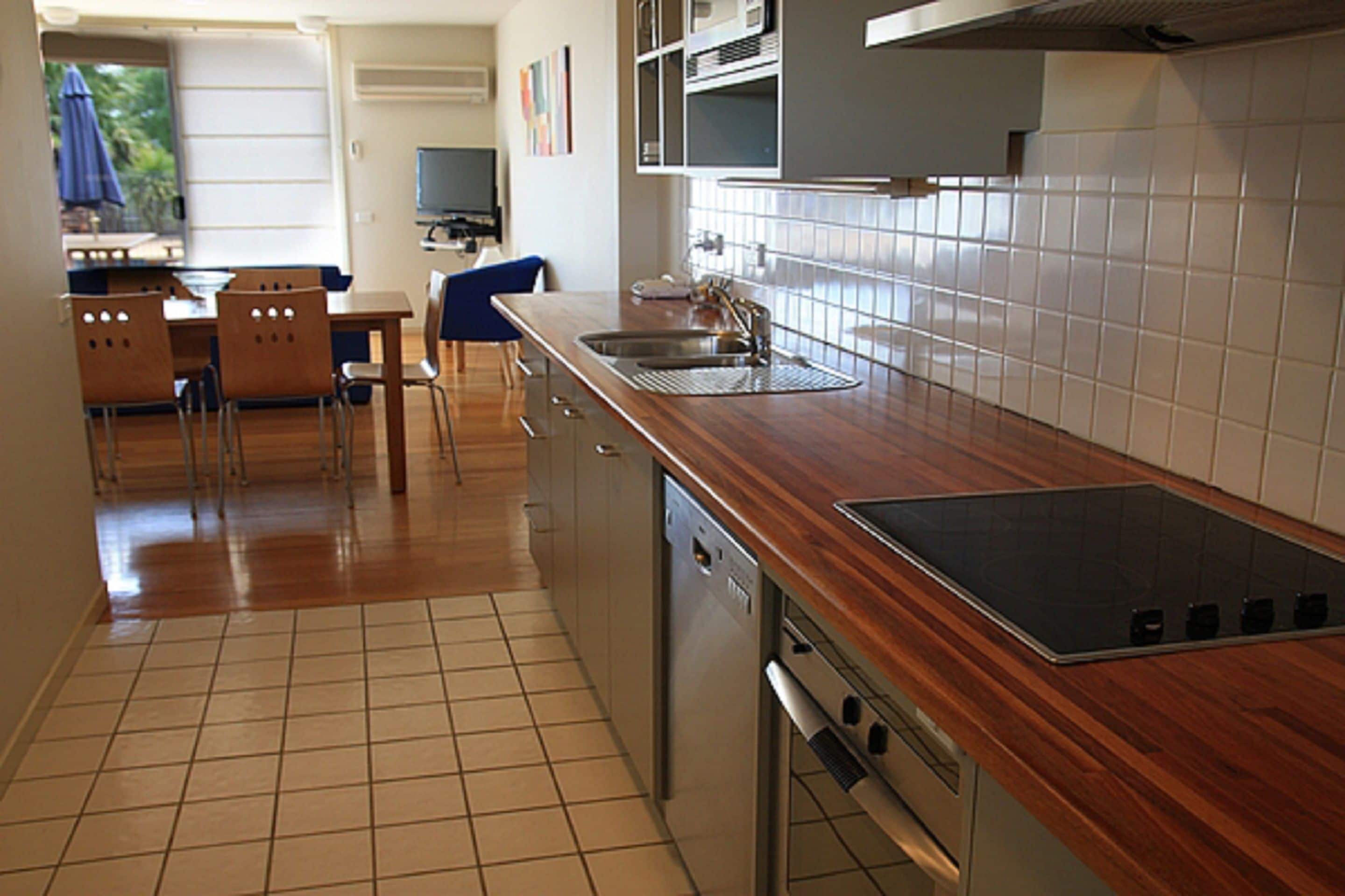 microwave, coffee/tea maker, cookware/dishes/utensils