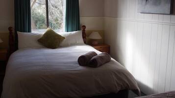 Premium bedding, iron/ironing board, free rollaway beds, free WiFi