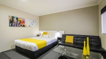 Deluxe Room, 1 Queen Bed | Desk, blackout curtains, iron/ironing board, free WiFi