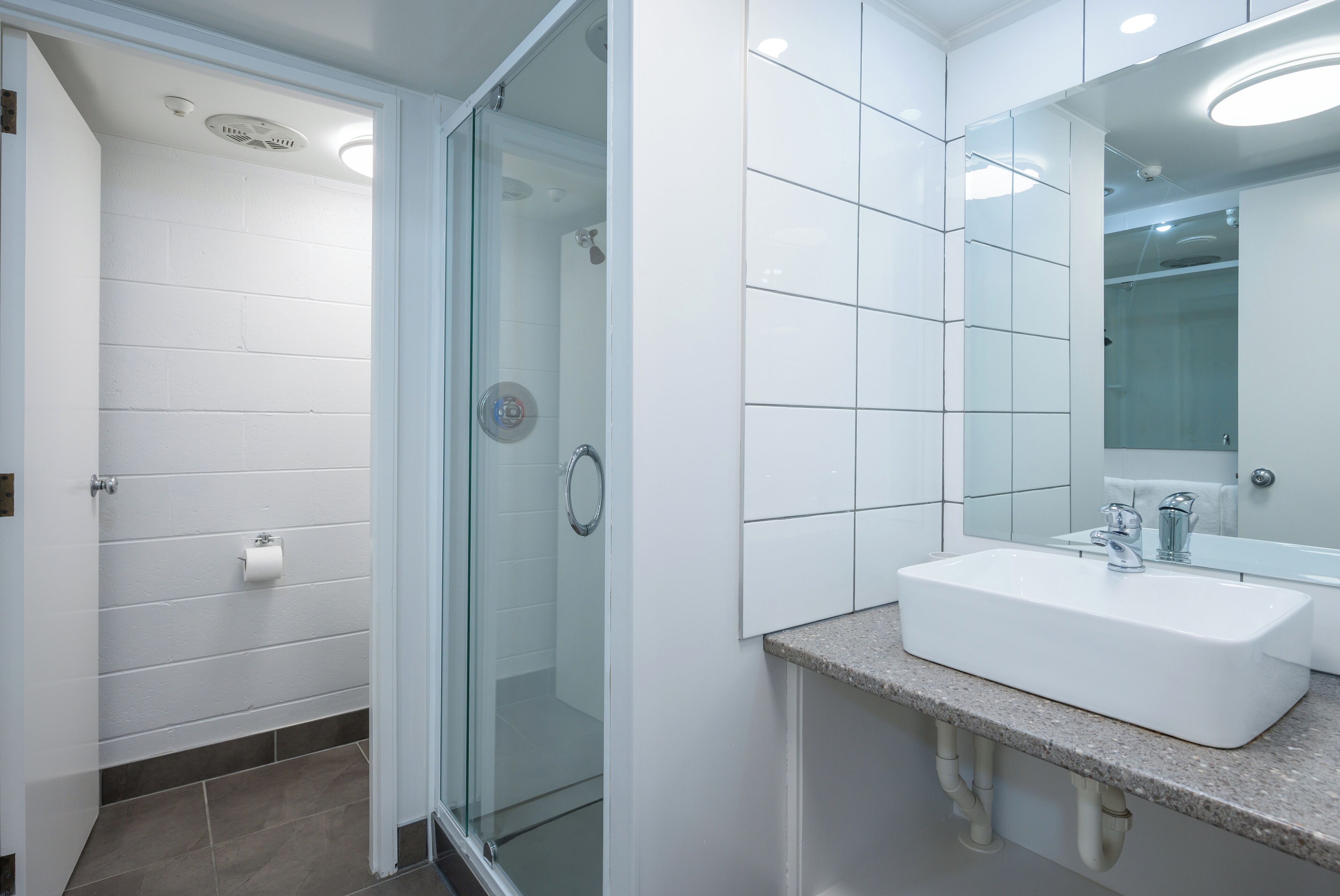economy studio | bathroom | shower, free toiletries, hair dryer, towels