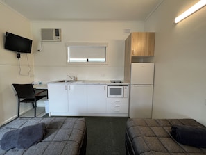 Chambre Deluxe avec lits jumeaux, 2 lits une place, cuisine | Cuisine privée