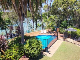 Outdoor pool, pool umbrellas, sun loungers