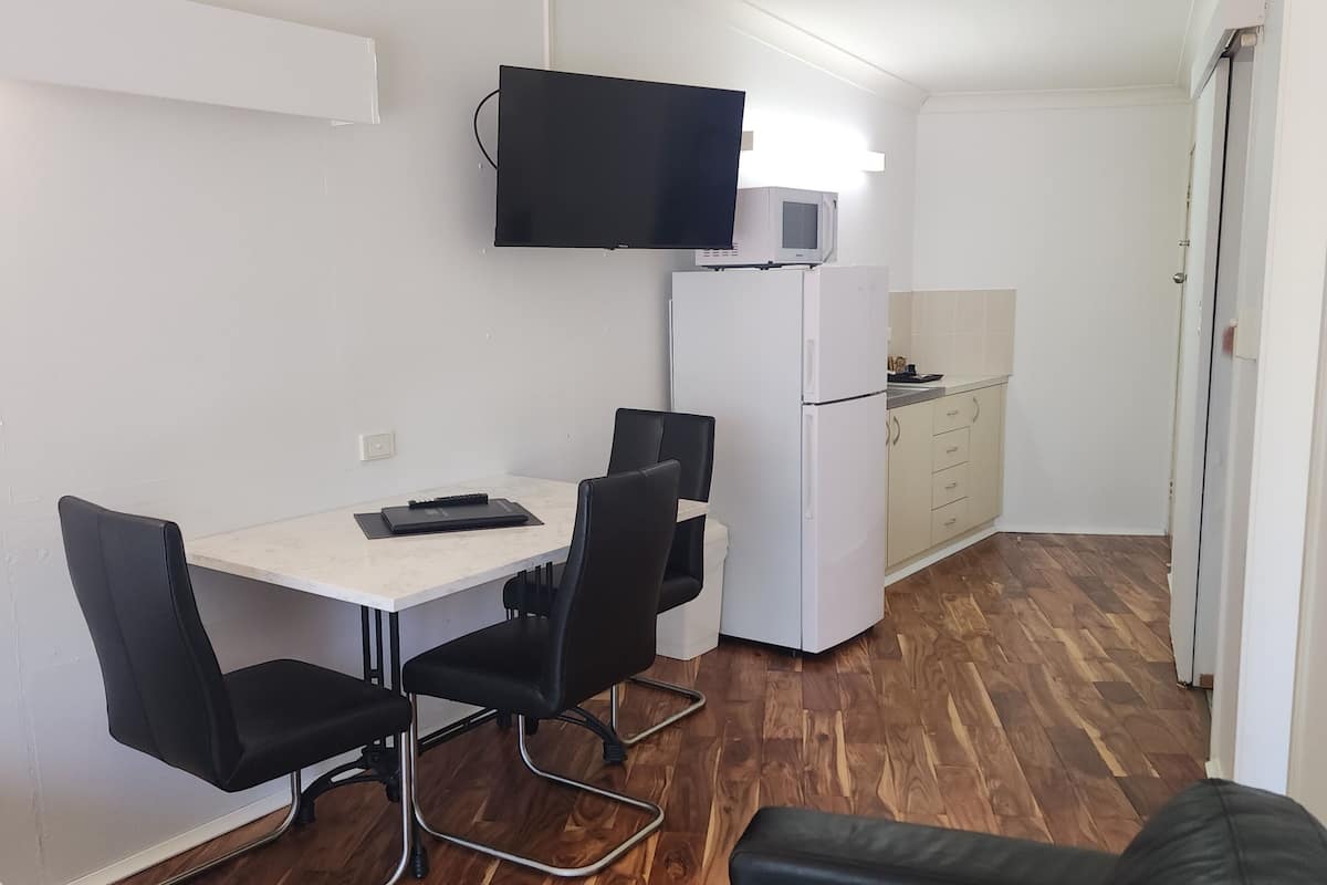 River Vista Suite | Living area | 42-inch TV with digital channels