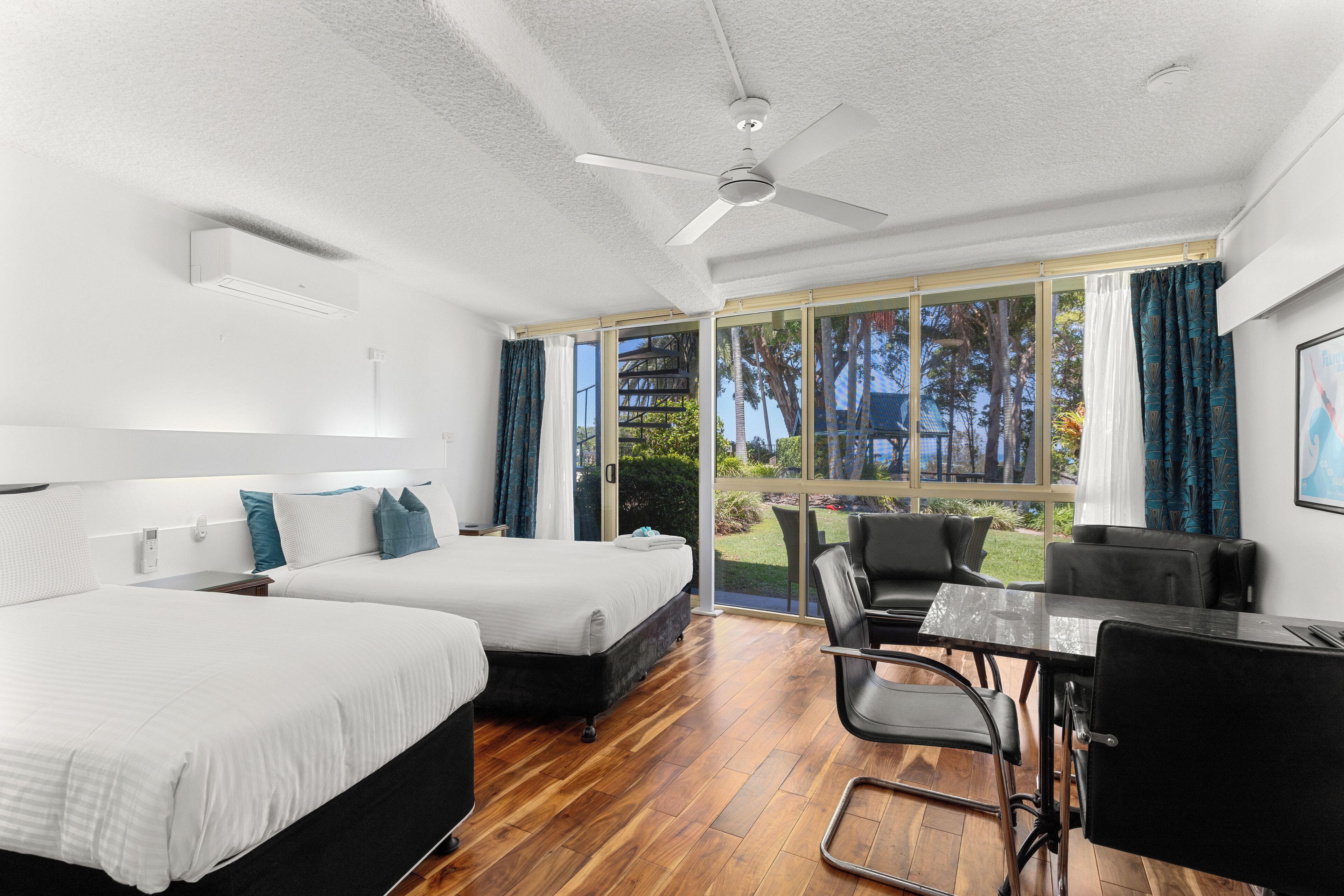 Habitación Grand | Tabla de planchar con plancha, cunas (de pago), wifi gratis