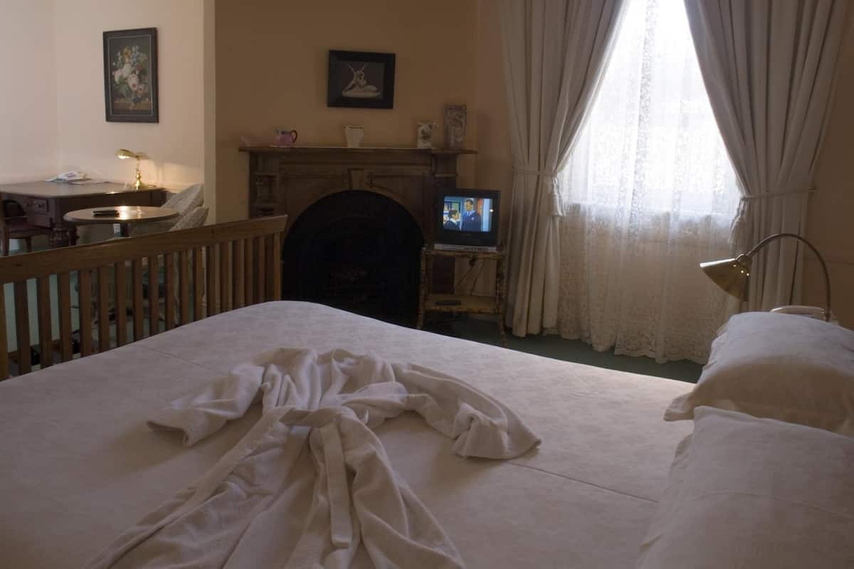 grand room | premium bedding, desk, iron/ironing board