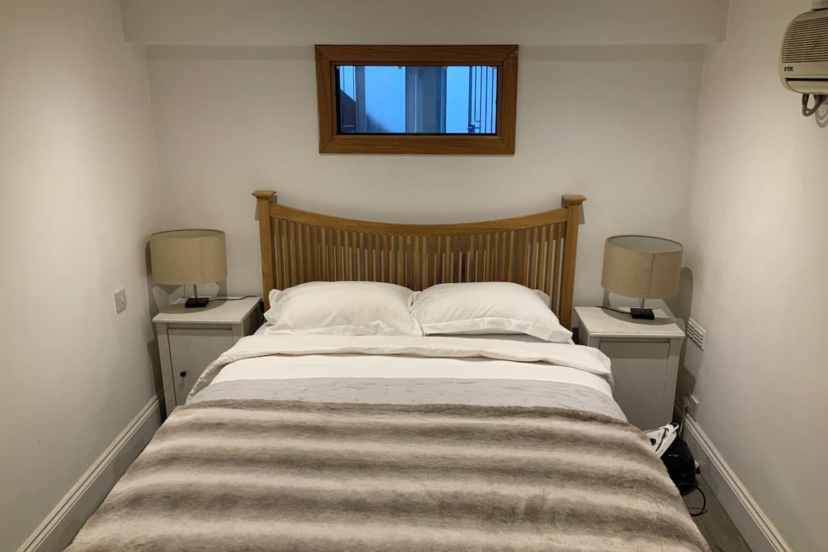 Standard Apartment, 1 Bedroom, City View | Desk, iron/ironing board, cribs/infant beds, rollaway beds