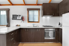 Cape Nelson Villa (2 Queens & 1 Single) | Private kitchen