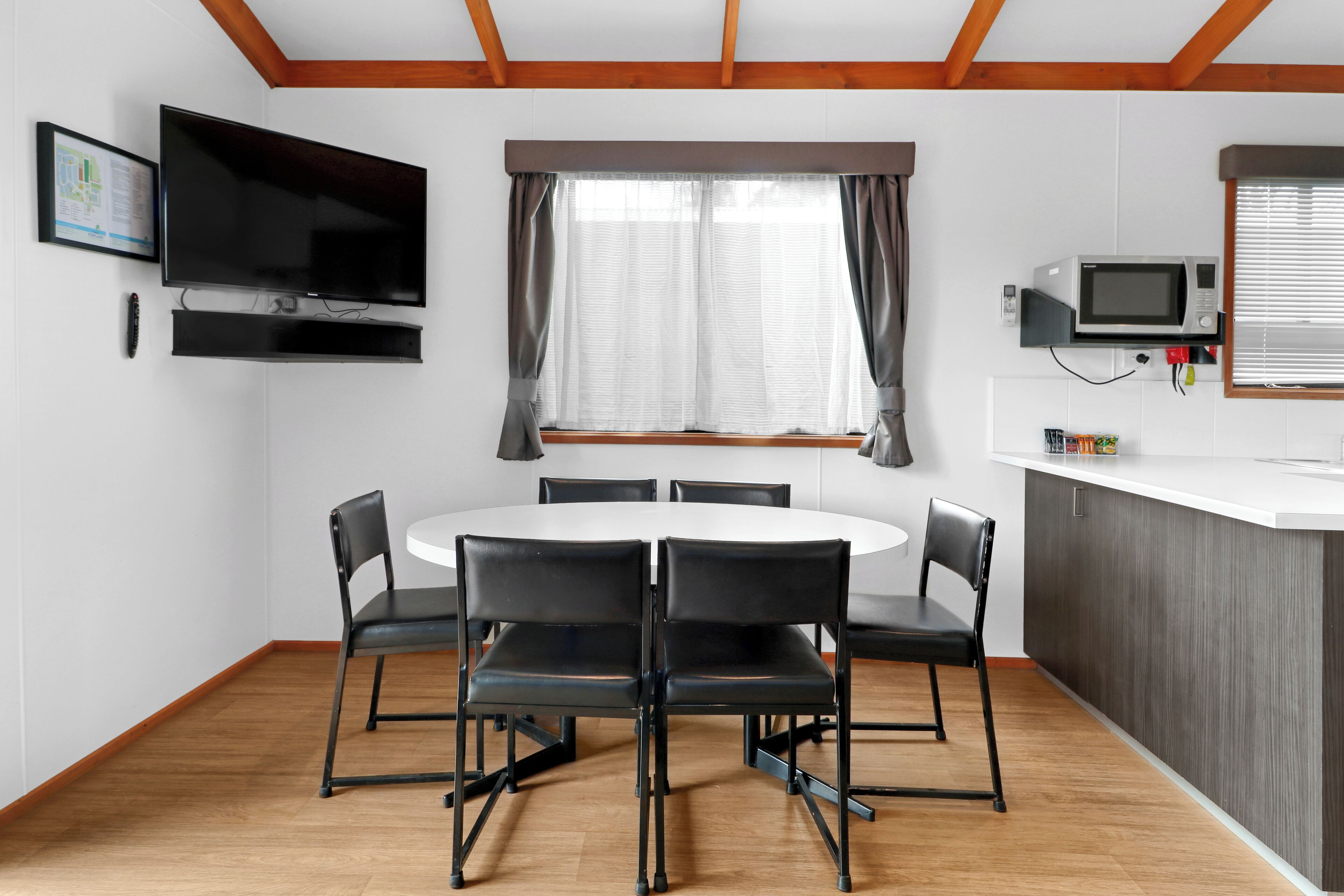 Corella Villa (1 Queen & 2 Bunks) | Living area | LED TV