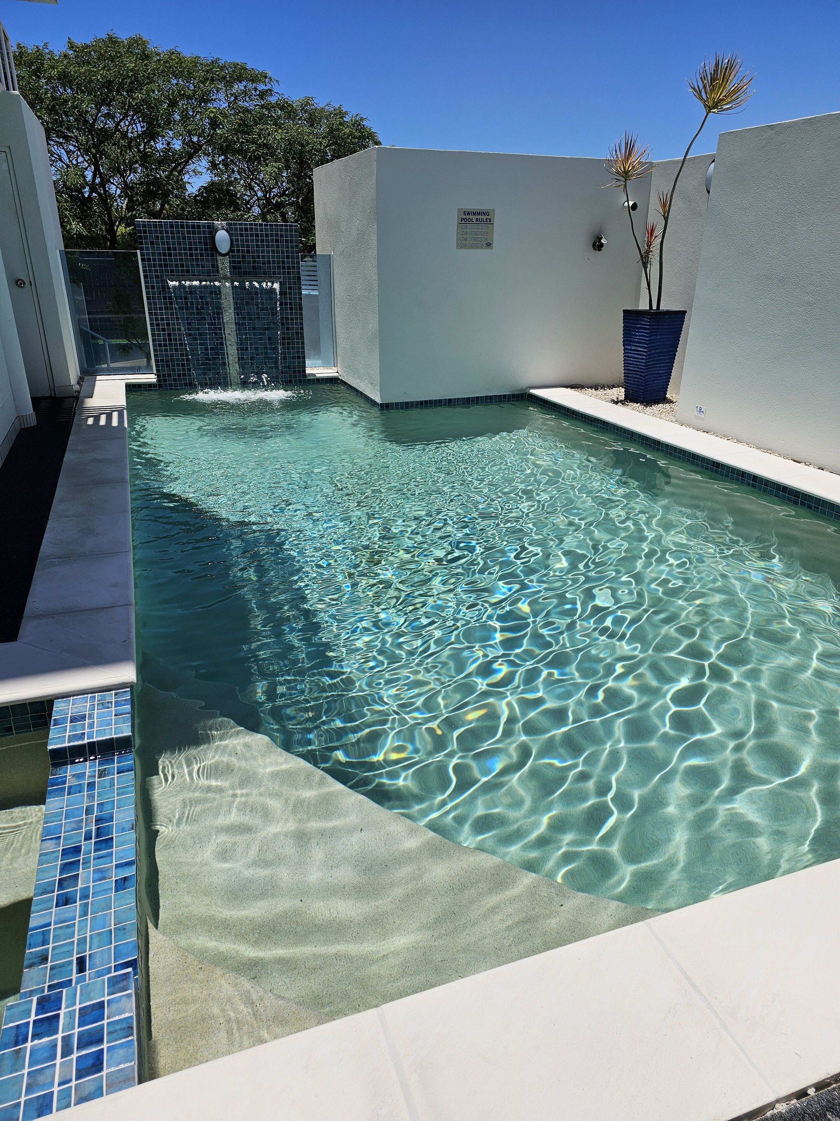 Outdoor pool, pool umbrellas, pool loungers