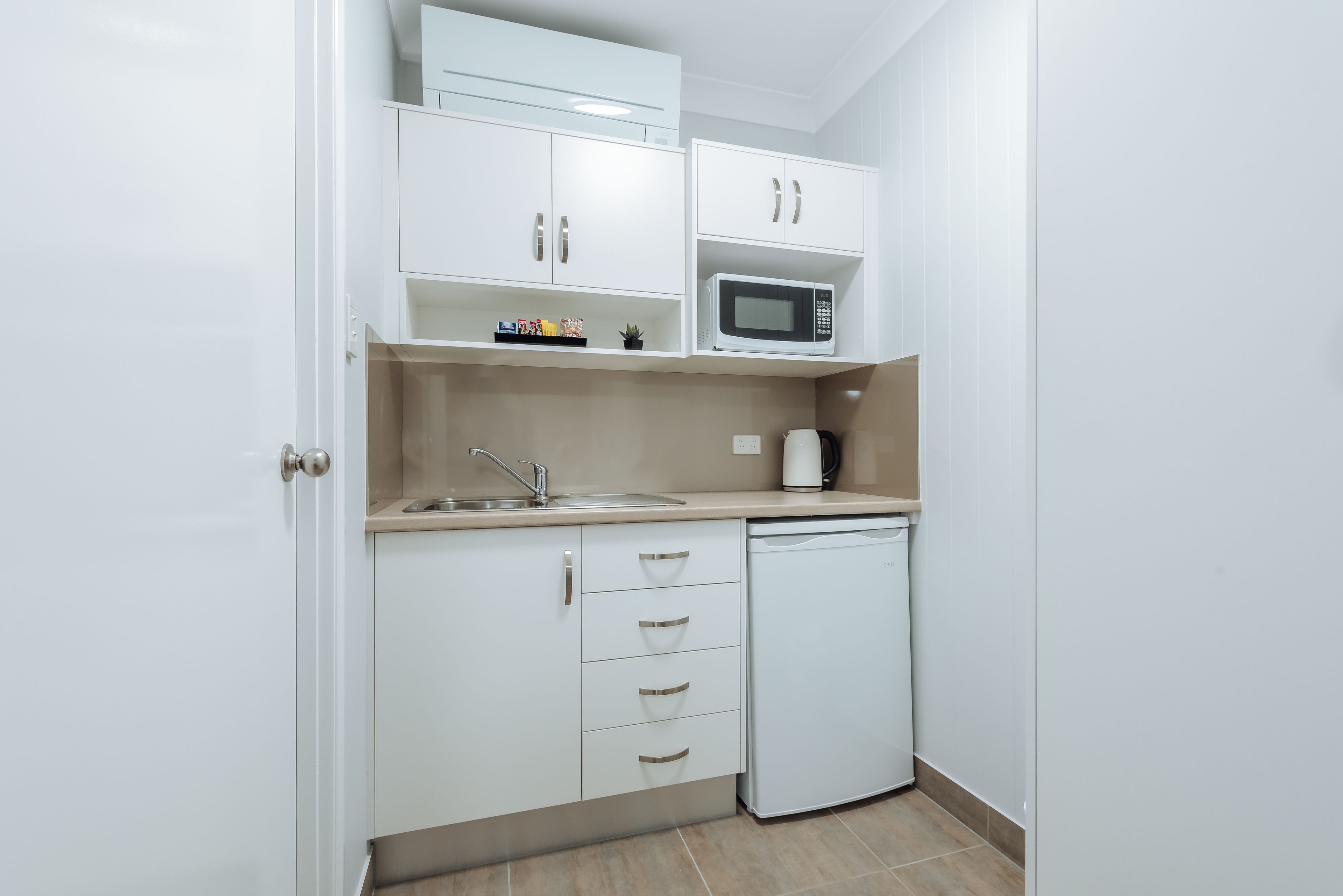 Fridge, microwave, coffee/tea maker, electric kettle