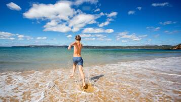 On the beach, fishing