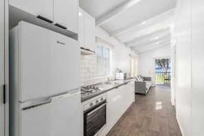 2 Bedroom Accessible Deluxe Beachfront Villa | Private kitchen | Fridge, microwave, oven, stovetop