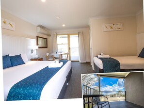 Executive King Family Room | Premium bedding, desk, iron/ironing board, free WiFi