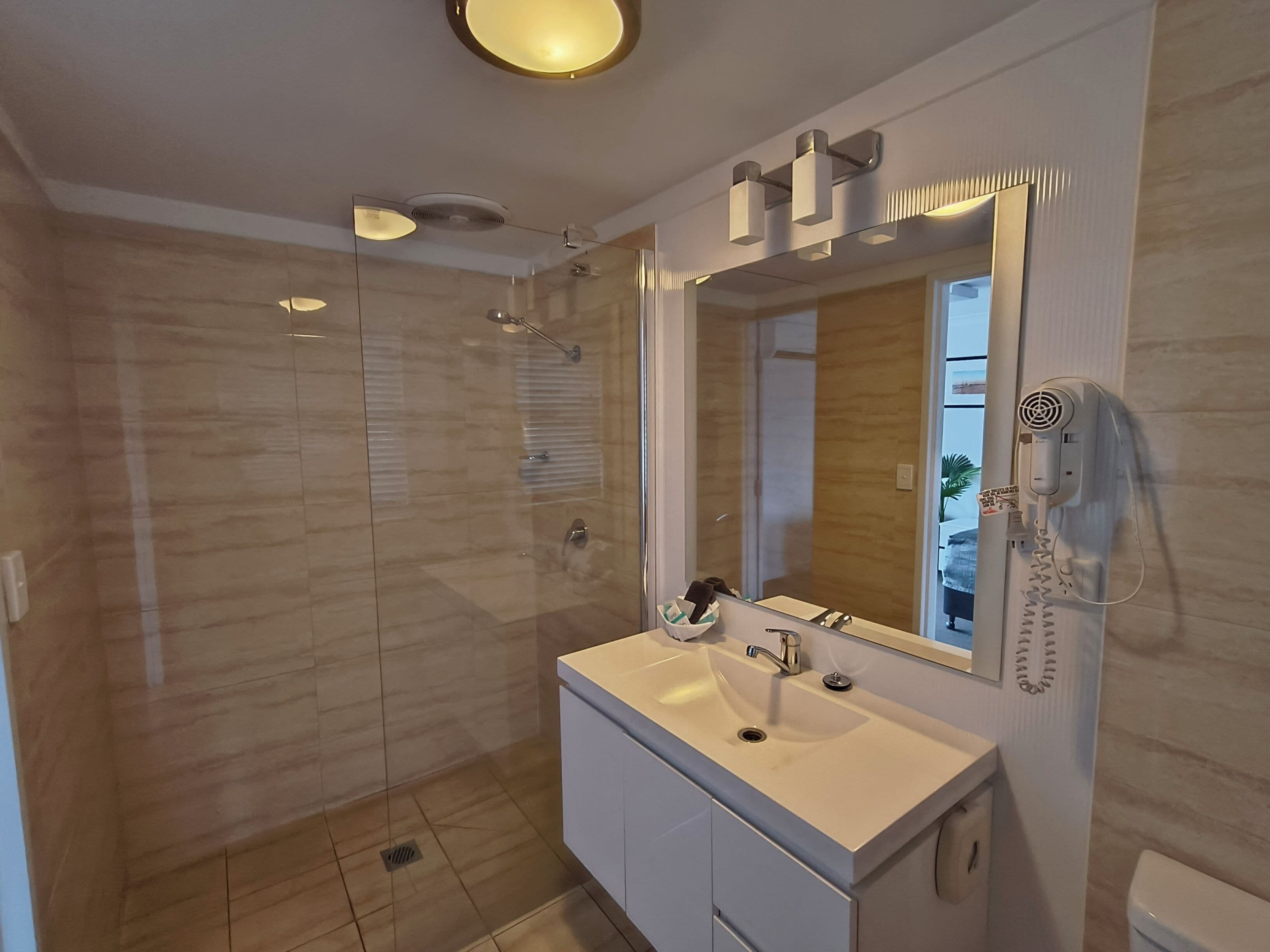 Standard Studio, Non Smoking (Queen and two singles) | Bathroom | Shower, rainfall showerhead, free toiletries, hair dryer