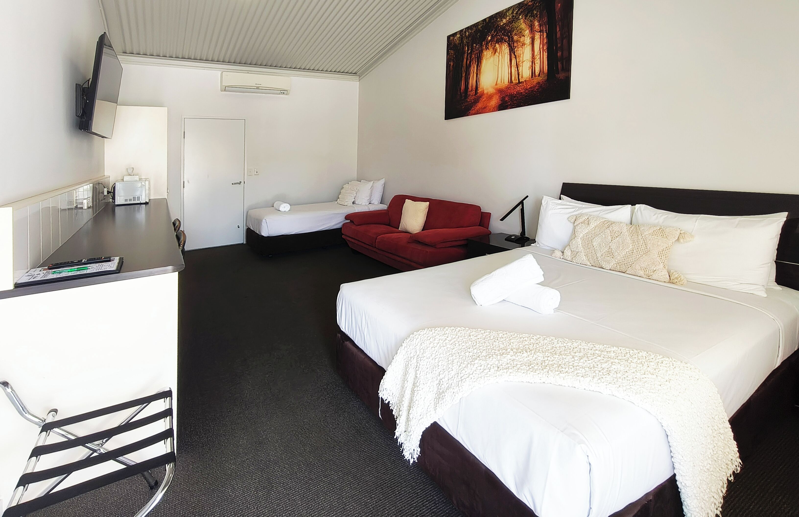 Deluxe Room, Non Smoking (Deluxe Queen and Single) | Desk, laptop workspace, iron/ironing board, free WiFi