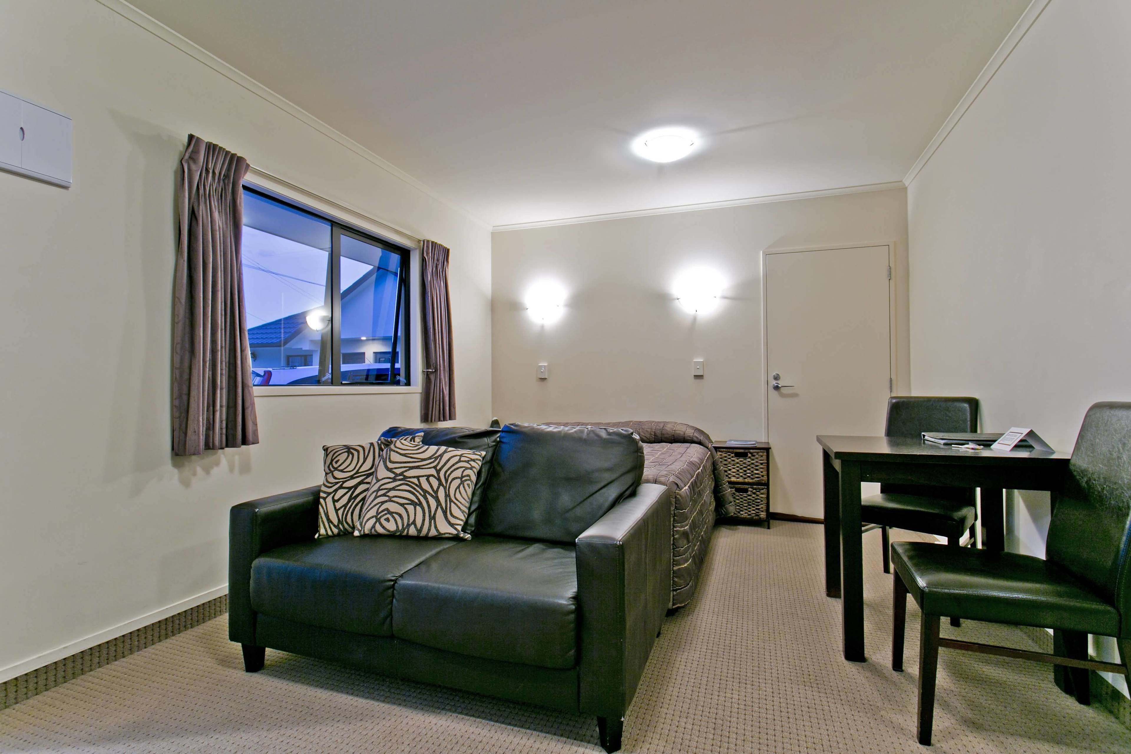 family suite, 2 bedrooms, jetted tub, courtyard area | premium bedding, desk, iron/ironing board, free wifi