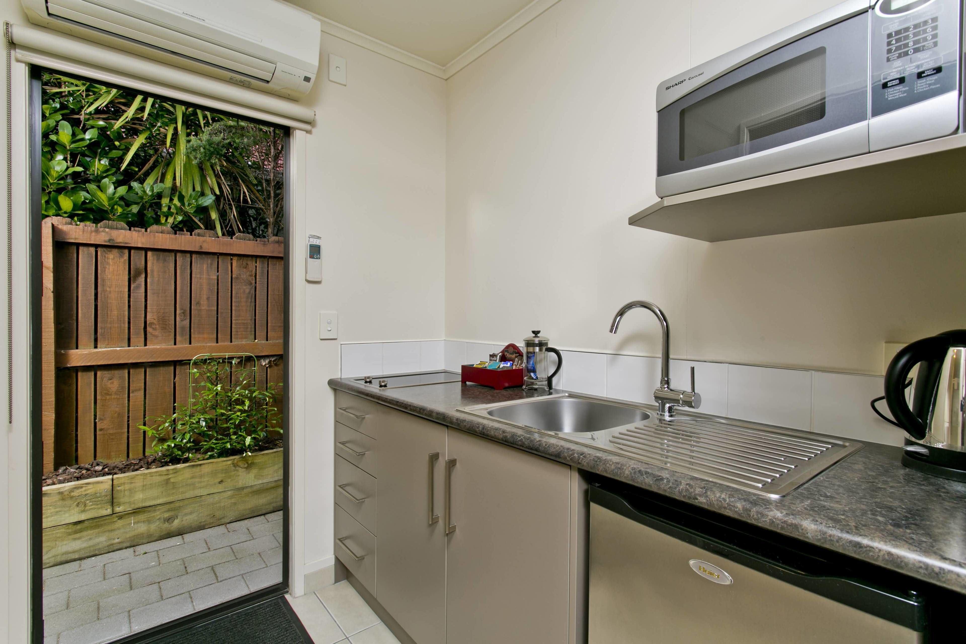 classic studio, kitchen, courtyard area | private kitchen | fridge, microwave, stovetop, coffee/tea maker