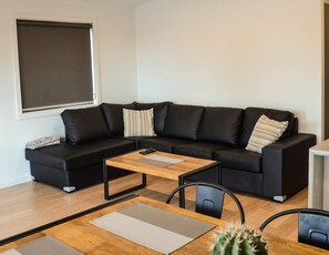 3 Bedroom Elevated Park View Cabin | Living area | LCD TV