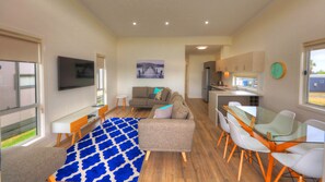 3 Bedroom Pool View Cabin | Living area | LCD TV