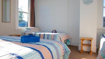 Family Room | Blackout curtains, free WiFi, bed sheets