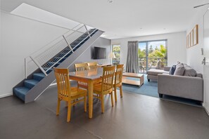 Two Bedroom Apartment with Pool View (Steep Internal Stairs) | Living area | 36-inch LCD TV with digital channels, TV - Corrigans Cove (Batehaven)