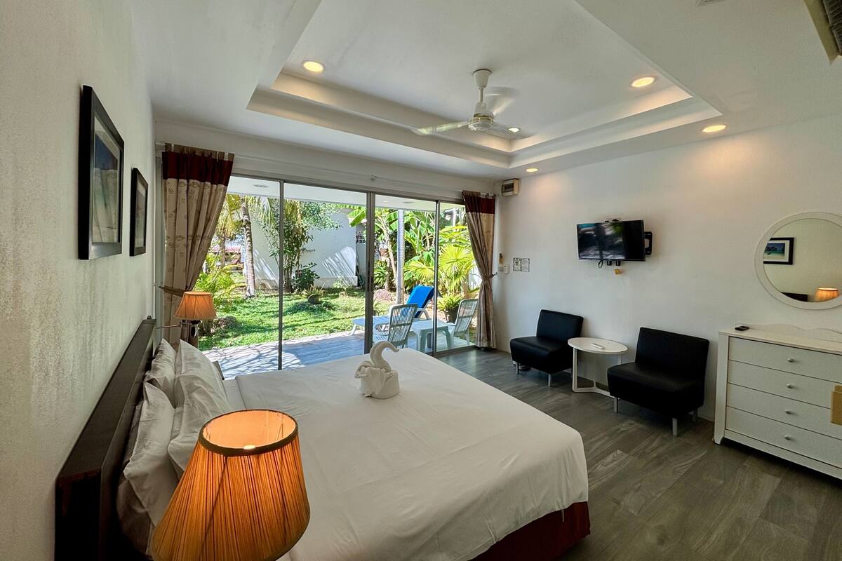 Deluxe Room, Pool View | In-room safe, desk, cribs (surcharge), WiFi (free)